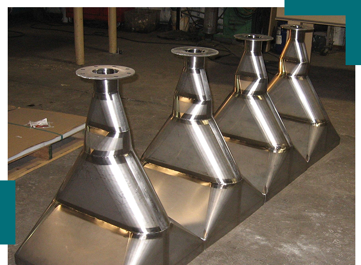 A group of metal cones sitting on top of each other.