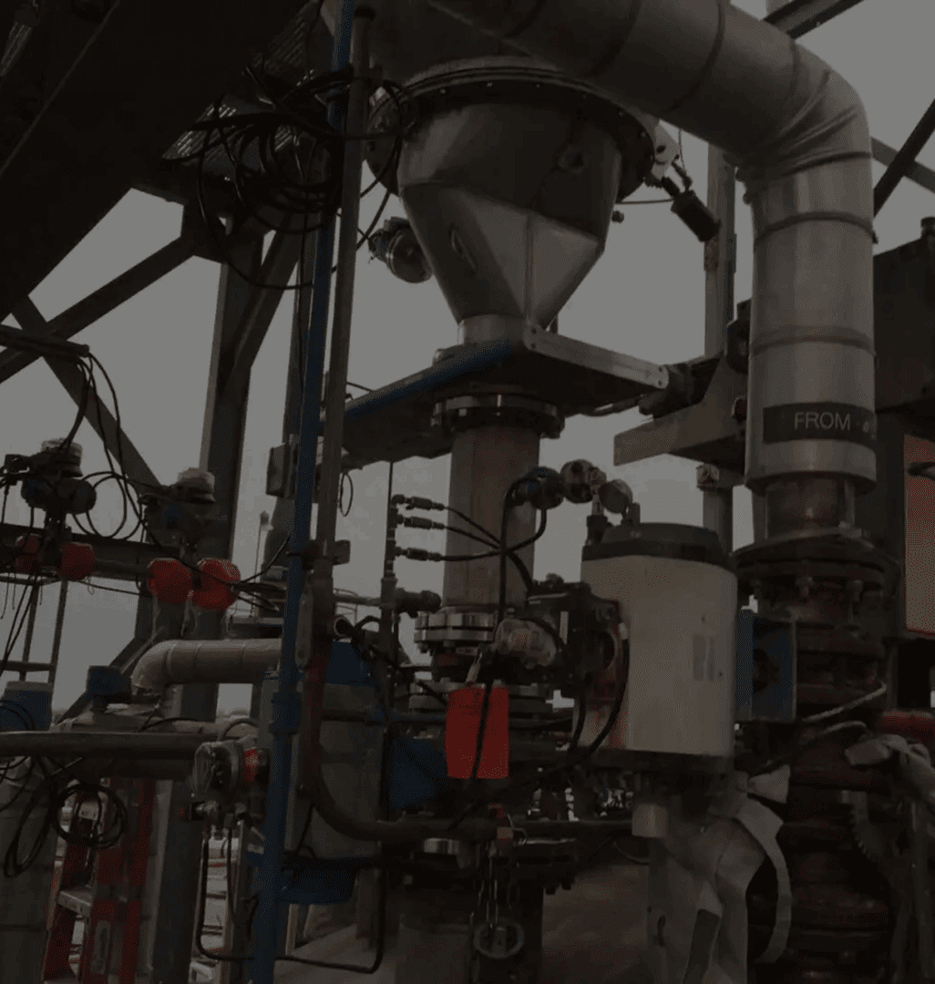 Industrial machinery with pipes and valves.